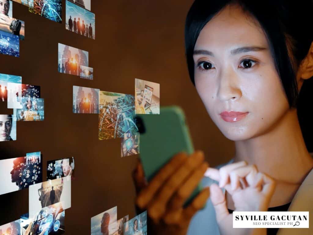 Woman viewing digital floating images on a phone.