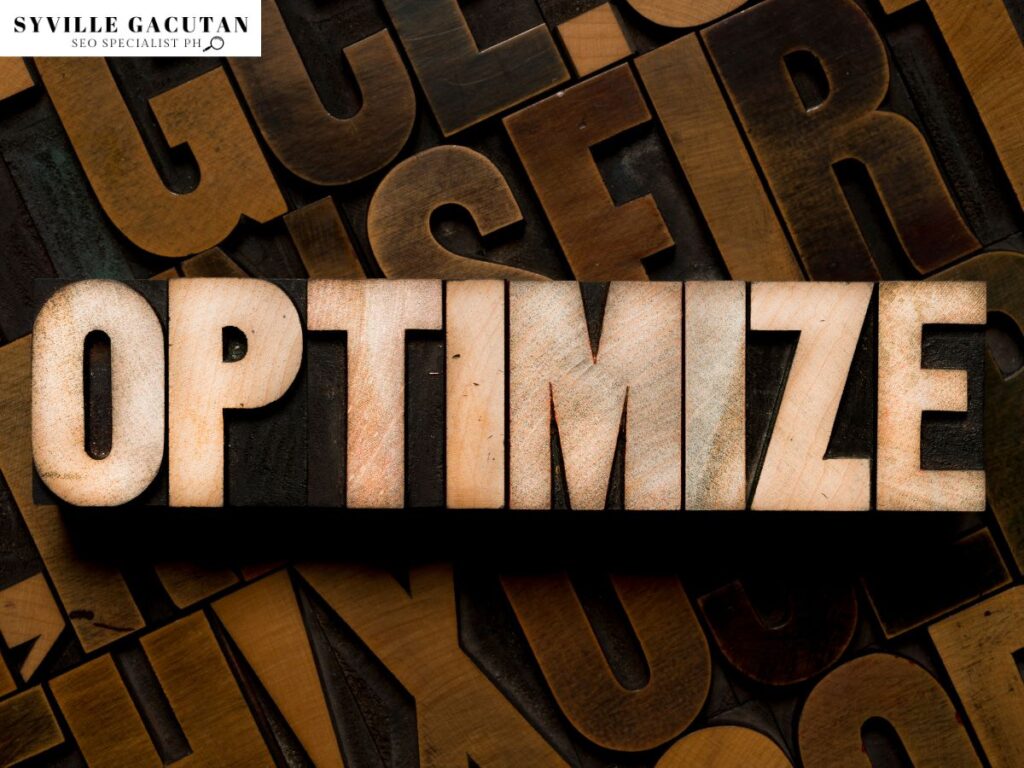 The word "OPTIMIZE" in a wooden board.