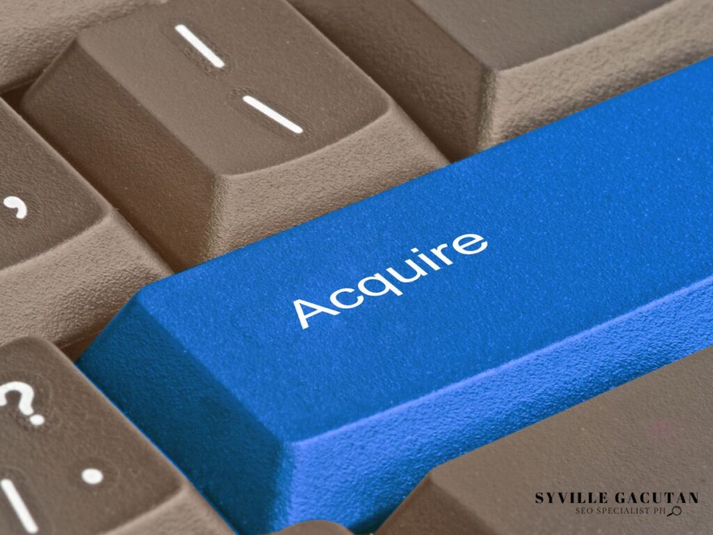 A blue keyboard key labeled as "Acquired"