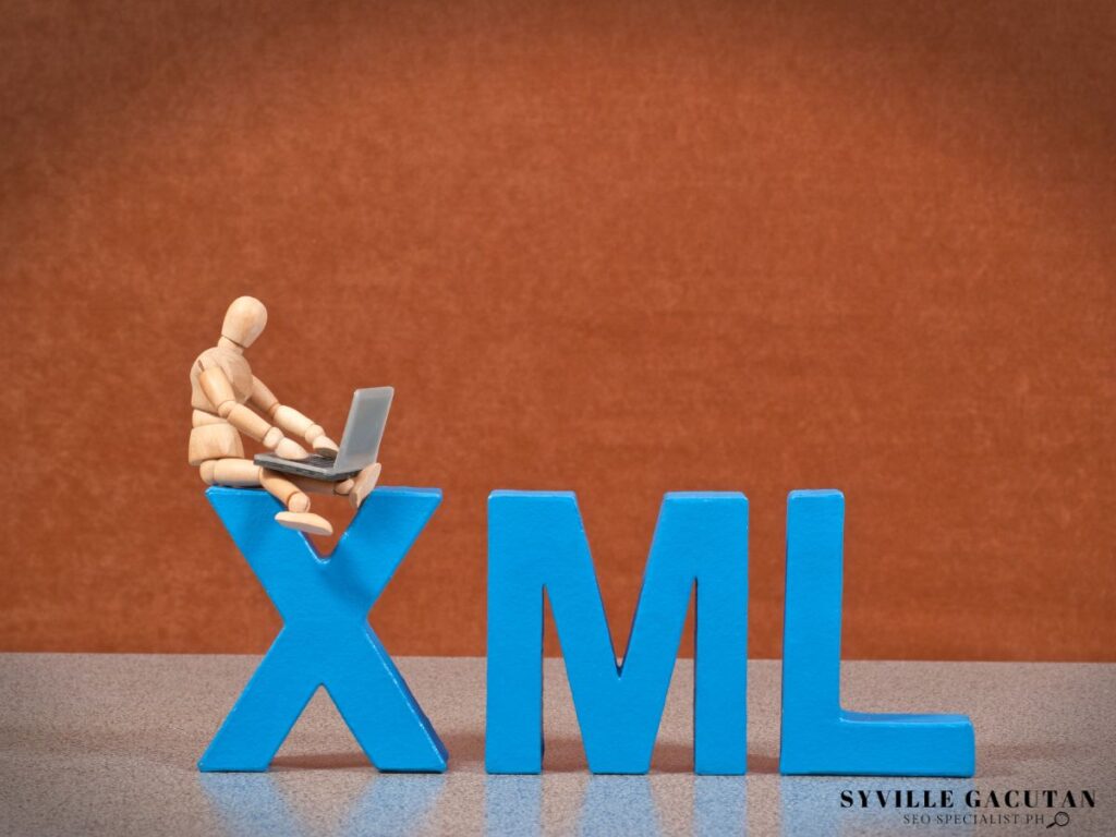 A figure sitting on the letter "X" in "XML" while working on a laptop.