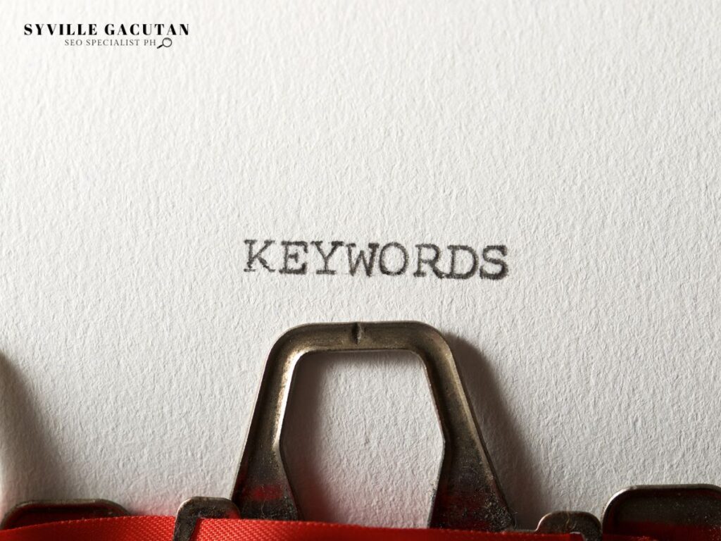 The word "KEYWORDS" typed on paper from a typewriter.