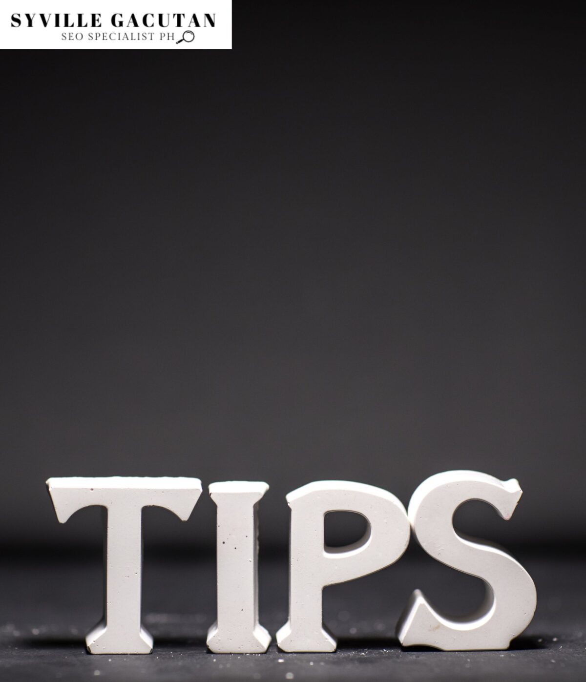 The word "TIPS" in white 3D letters against a dark background