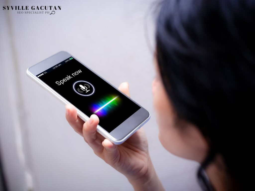 Woman using voice search on her phone