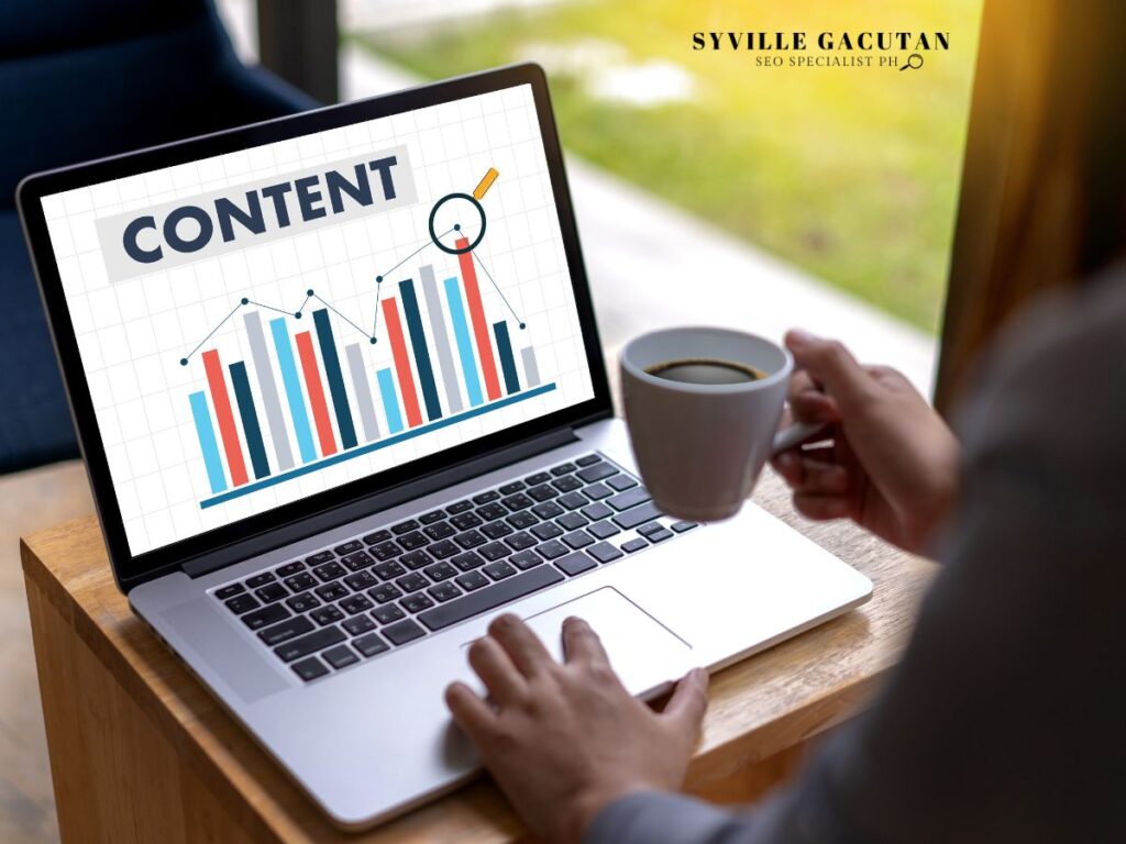 A laptop displaying content-related data analysis, with someone holding a coffee cup.