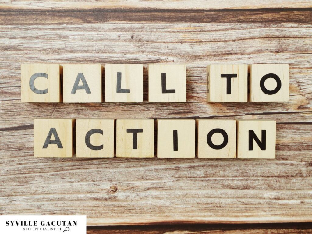 Wooden blocks with the text reading "CALL TO ACTION" placed on a wooden surface.