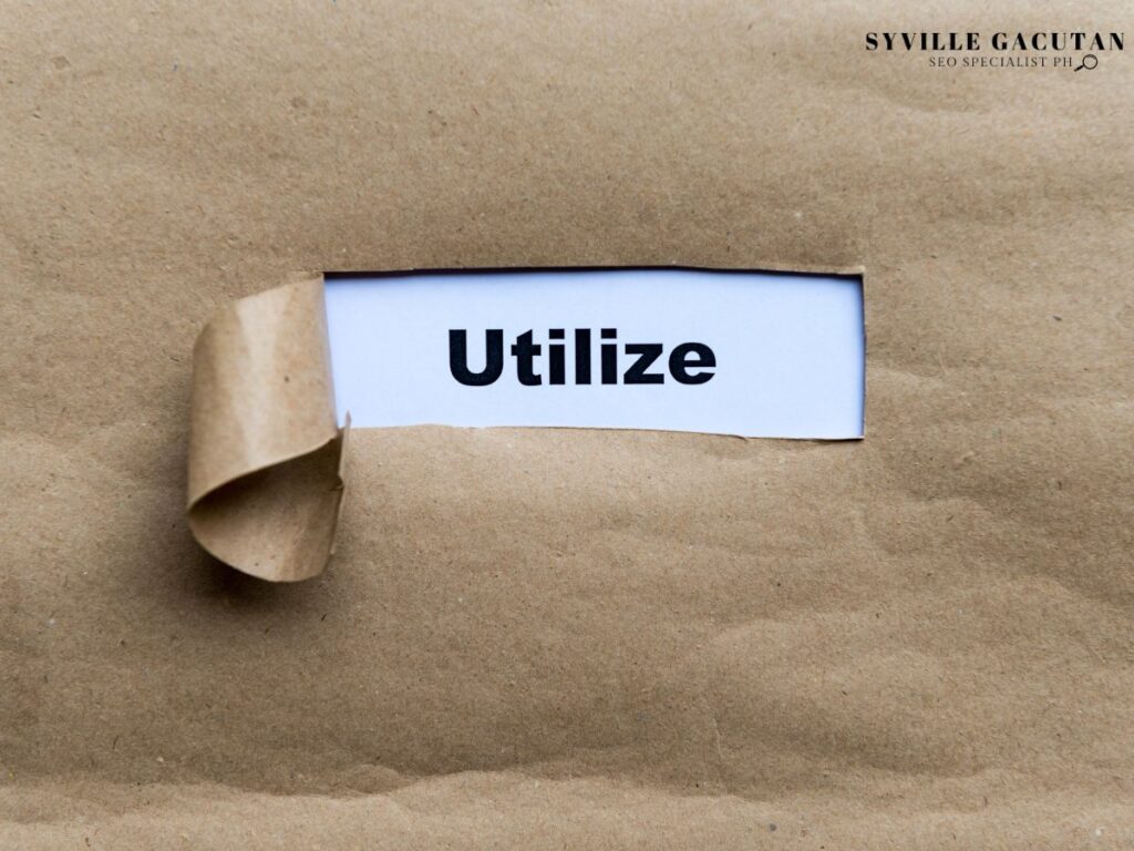 The word "Utilize" popping out from the torn paper.