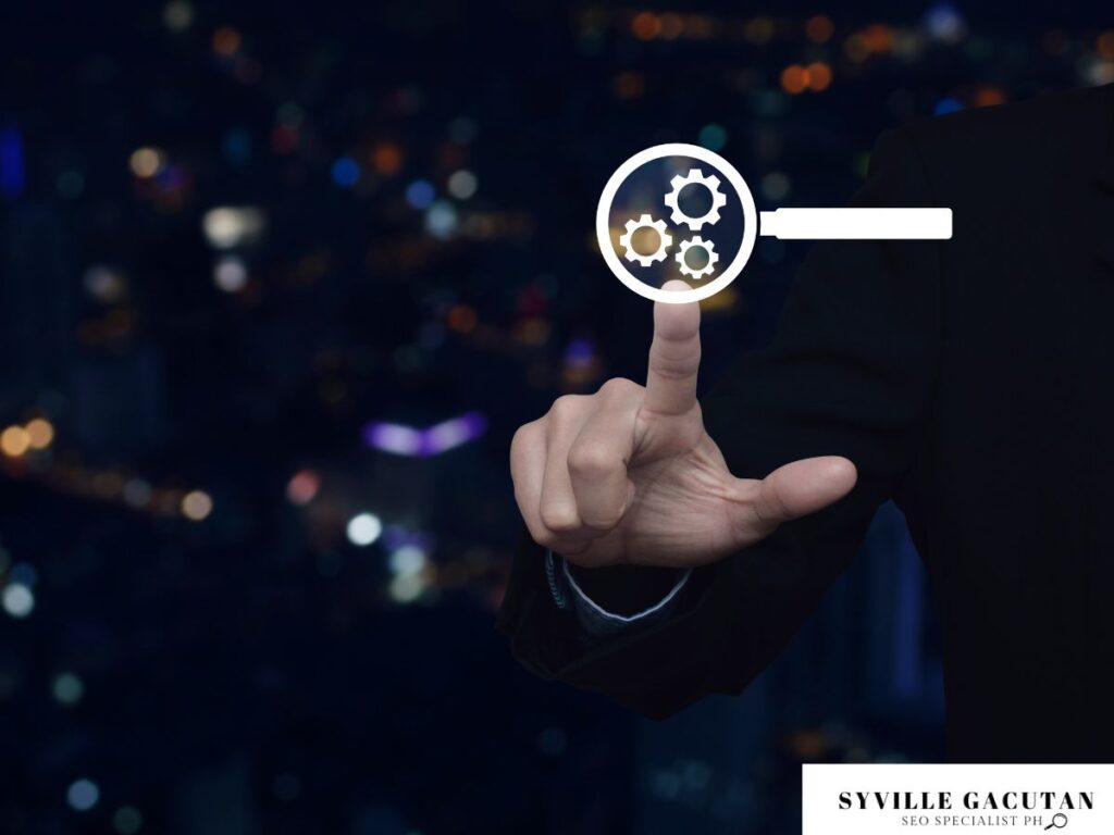 Finger pressing a virtual gear icon in the air