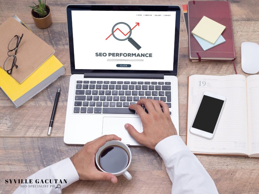 Hand on a laptop displaying "SEO Performance" screen.