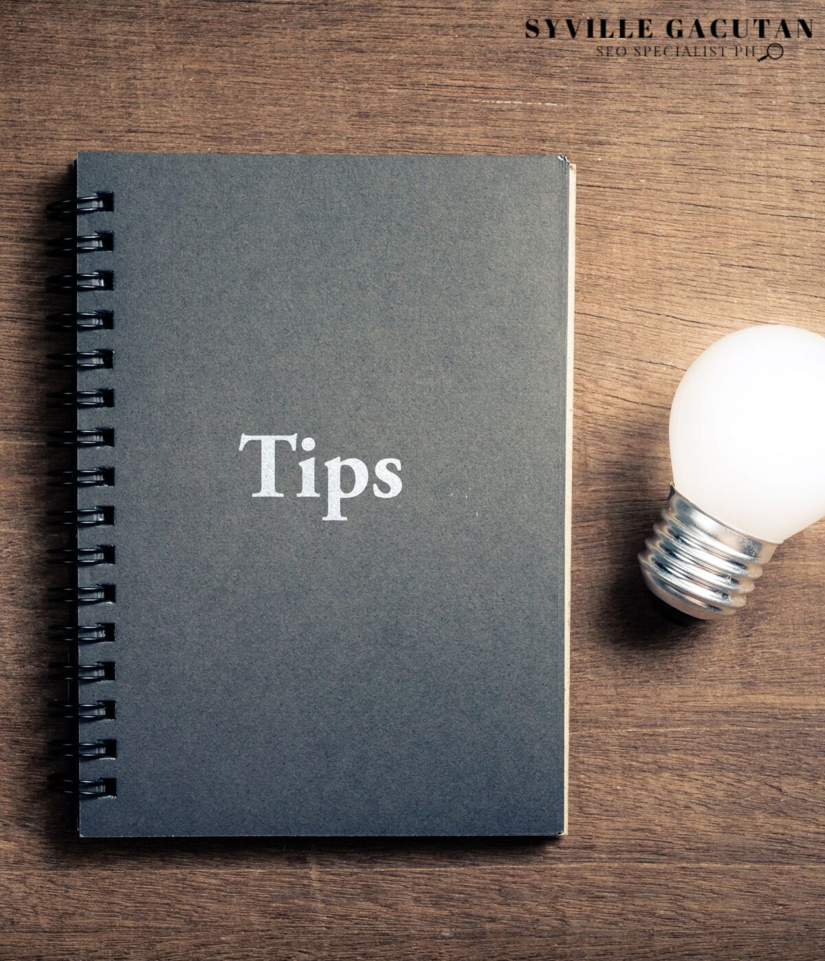 Notebook labeled "Tips" next to a lightbulb.