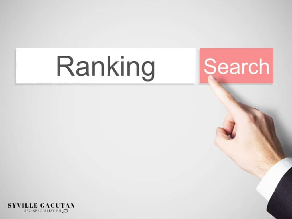 A search bar labeled "Ranking" and "Search" with a hand pressing the search button.