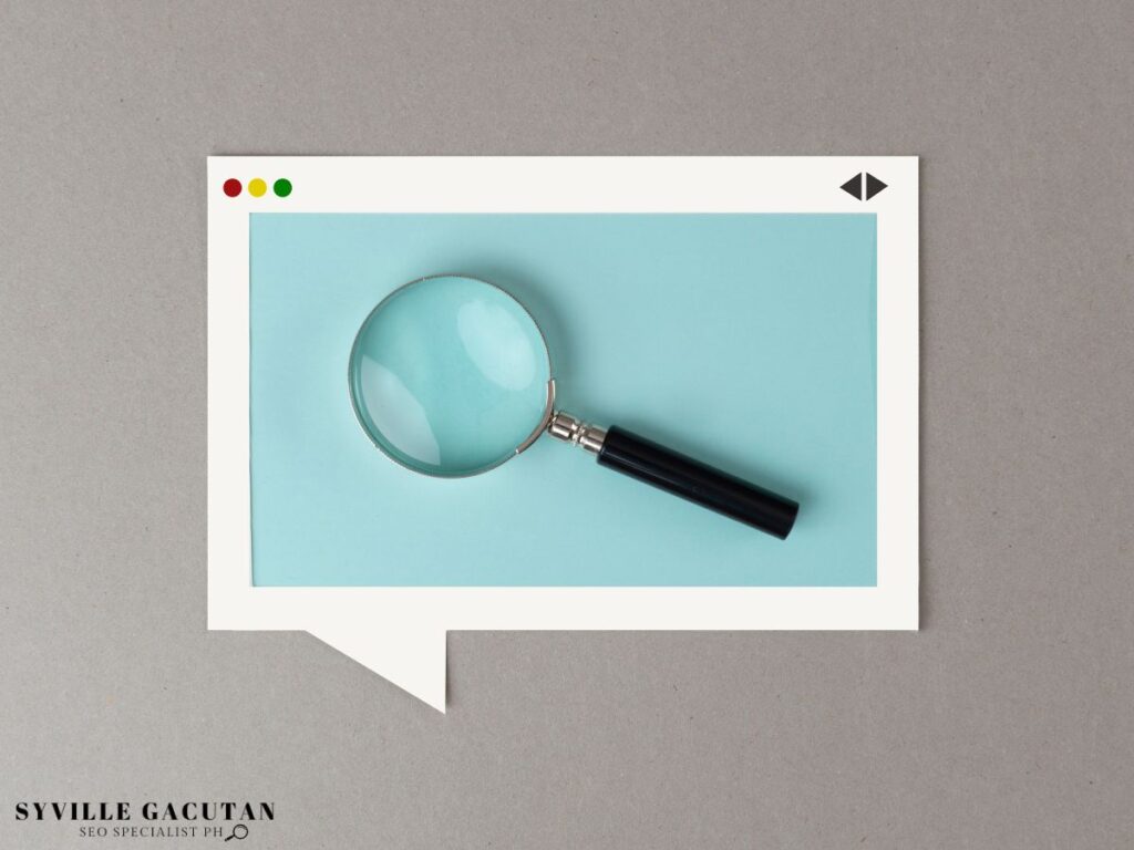 A magnifying glass displayed inside a browser window frame.