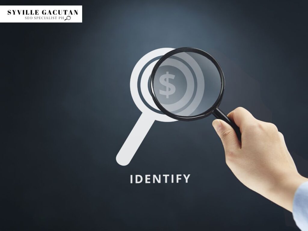 A hand holding a magnifying glass focusing on a white magnifying glass icon with dollar sign.
