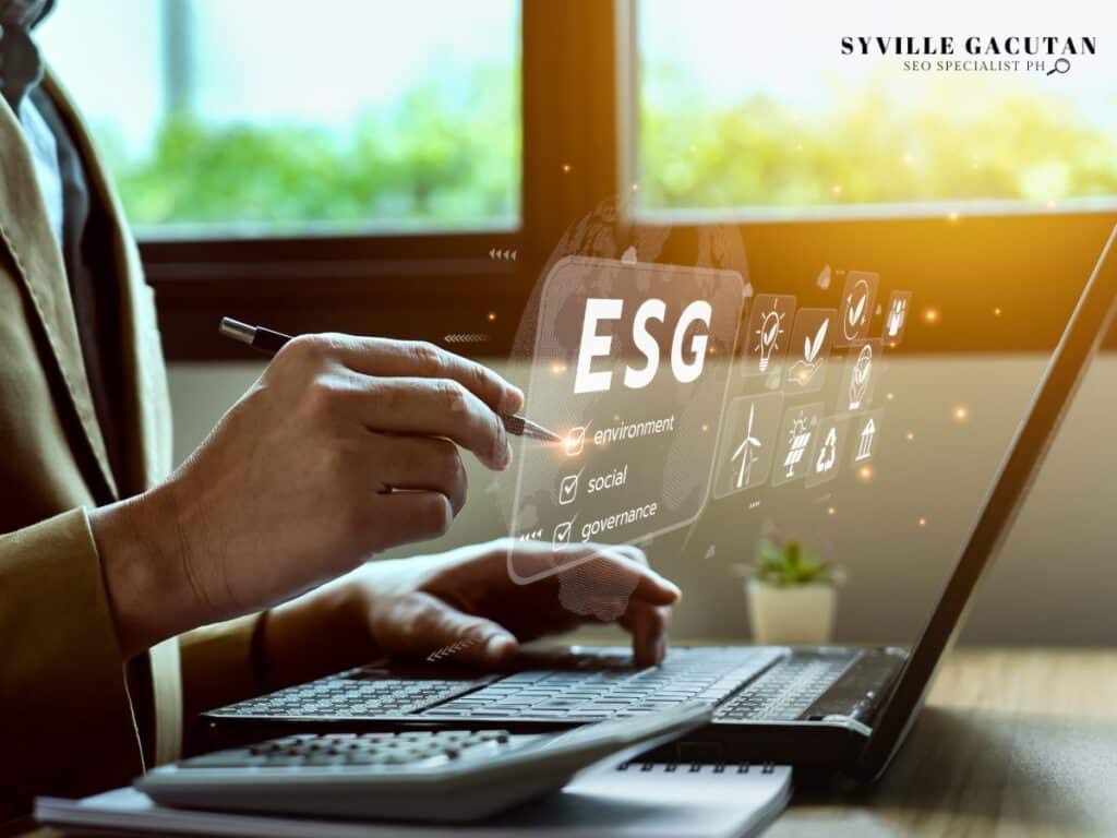 A person using a laptop with "ESG"  icons displayed.