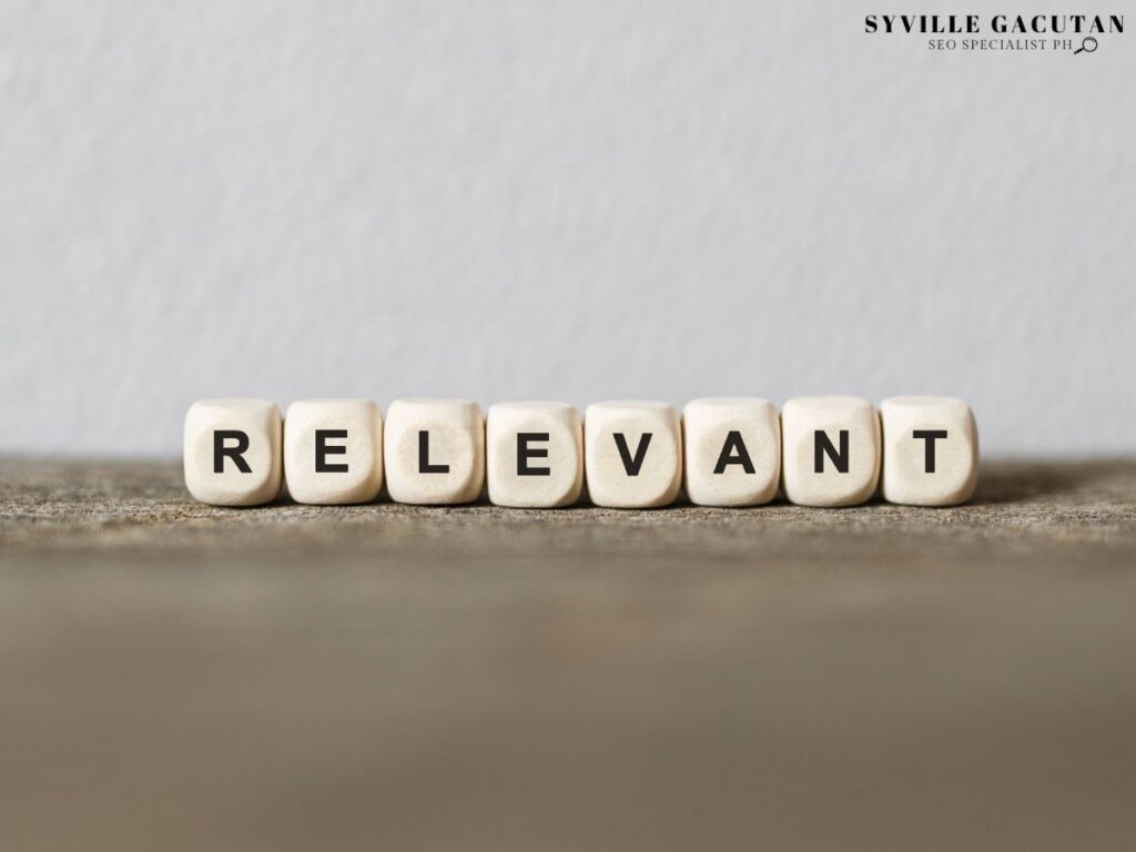 The word "RELEVANT" made with wood building blocks.
