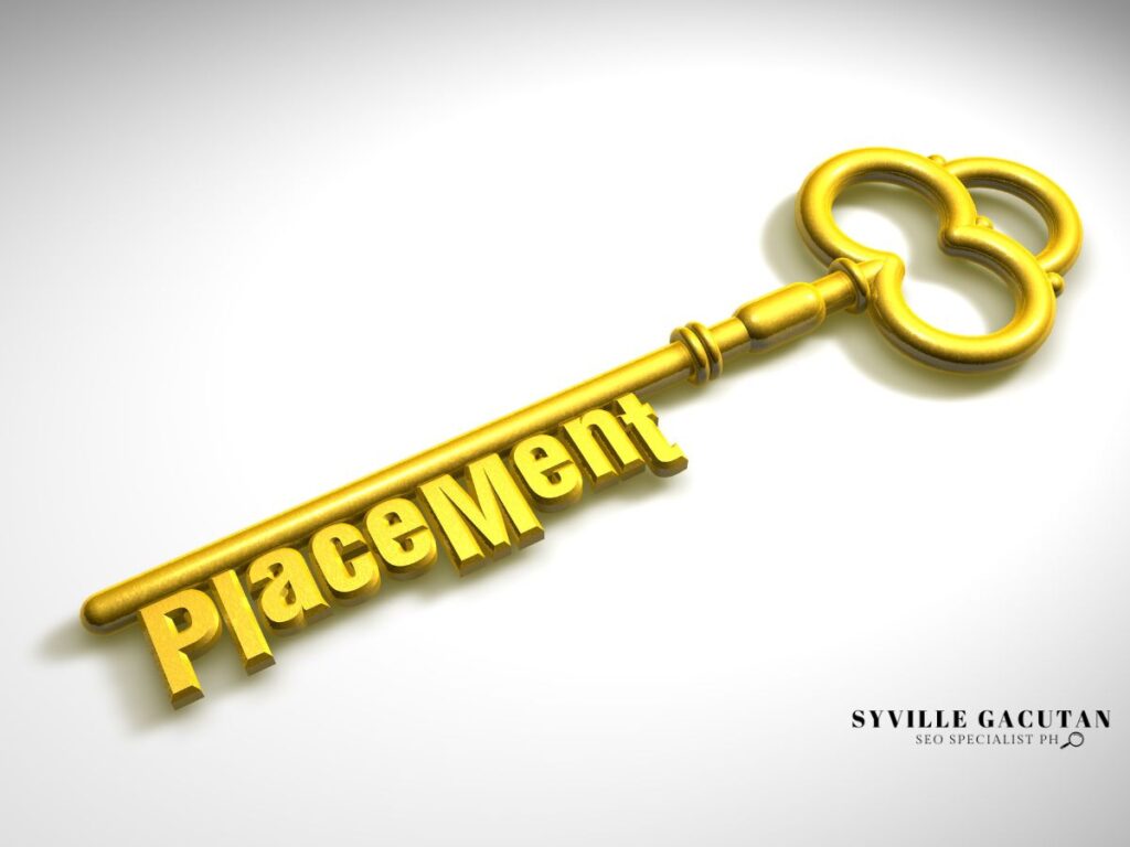 A key with a carved word "placement" 