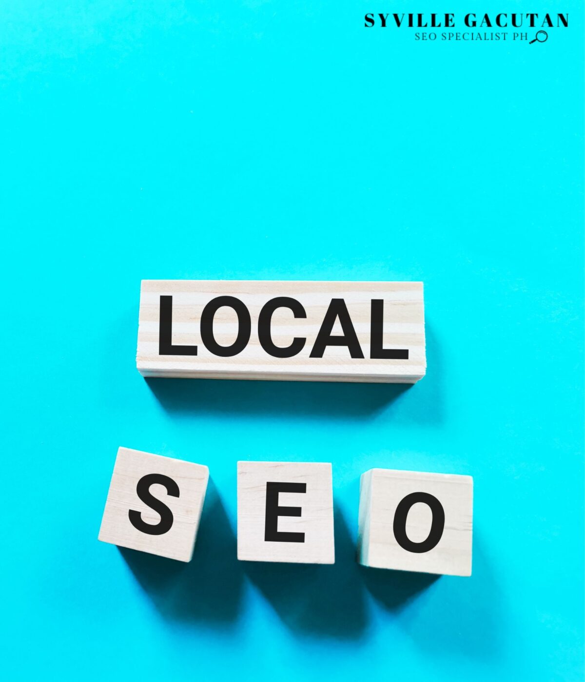 A wooden blocks spelled "LOCAL SEO" in a light blue background.