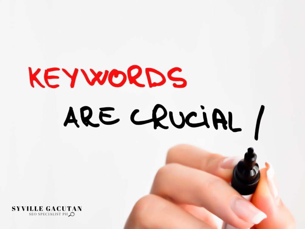 "KEYWORDS ARE CRUCIAL" written in red and black on a whiteboard.