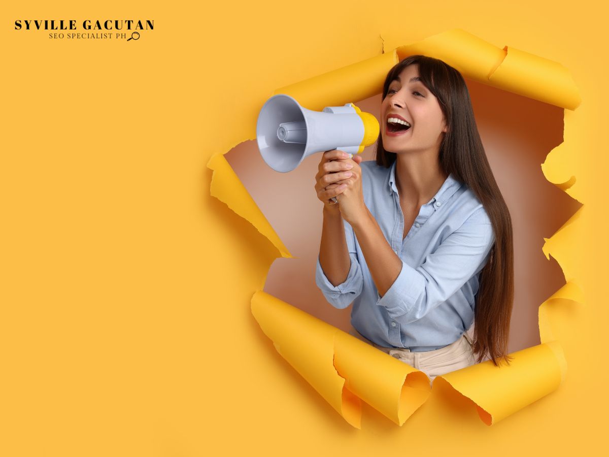 Woman holding a megaphone bursting through a yellow background.