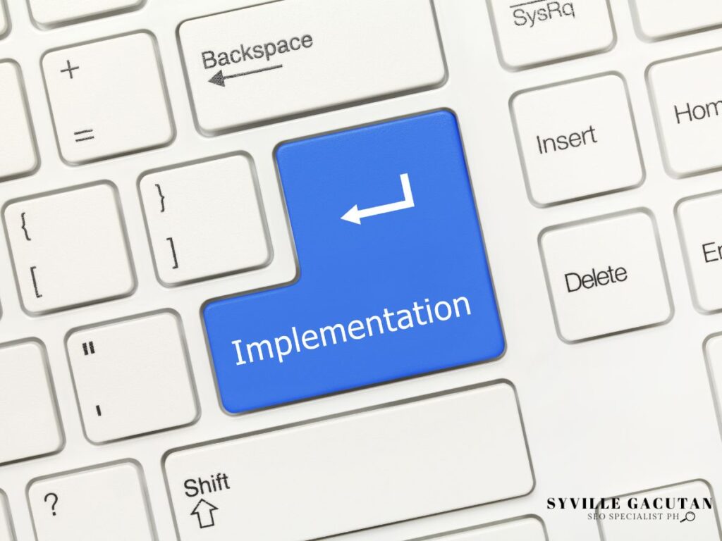 Blue "Implementation" key on keyboard.