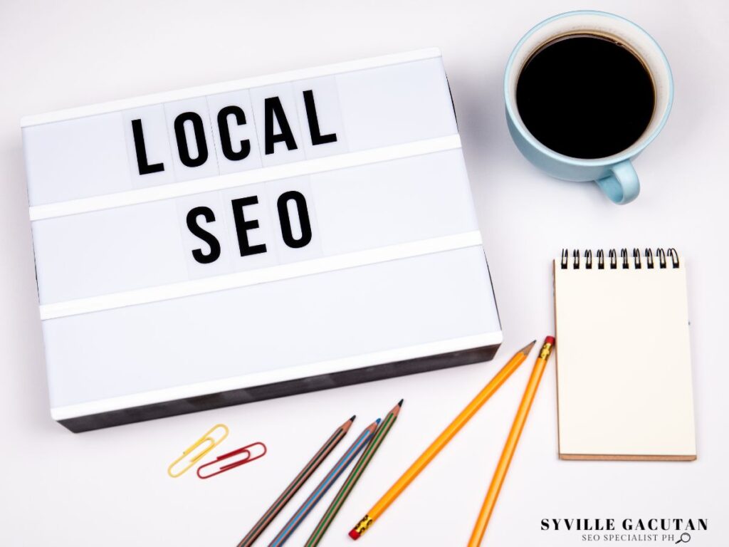 Lightbox displaying 'LOCAL SEO' with coffee and stationery.