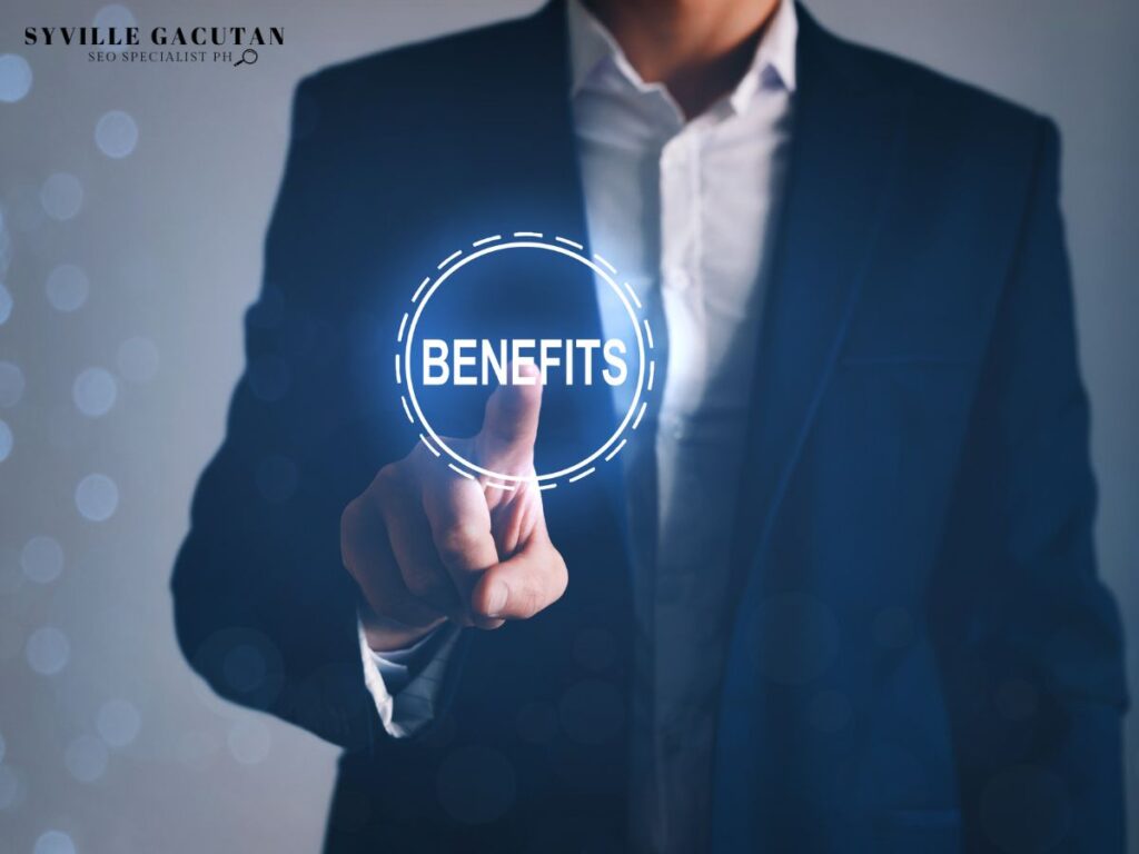 A man in a suit pointing at a glowing "BENEFITS" button with a dark blurred background.