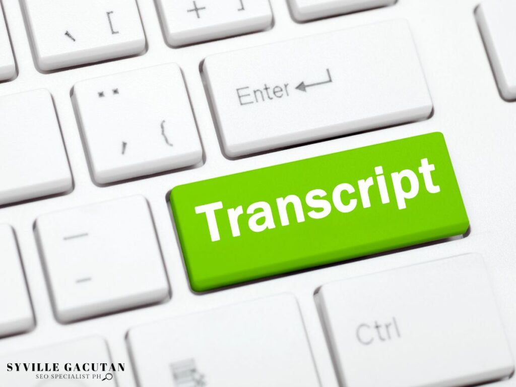A green "Transcript" key on a white keyboard.