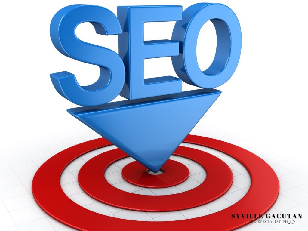 The word "SEO" in blue above a red bullseye target.