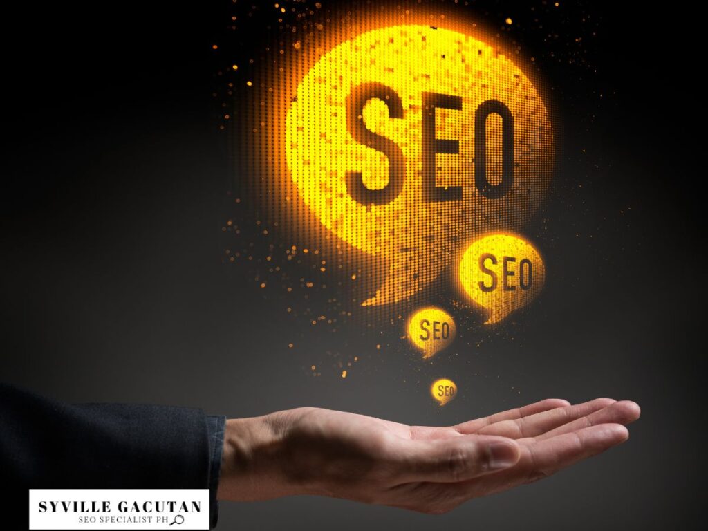 A glowing yellow "SEO" speech bubble emerging from a hand in a dark environment.