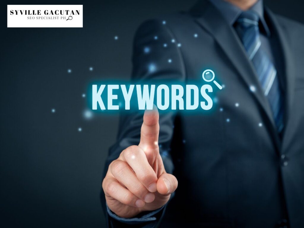 A person pointing at the glowing word "KEYWORDS" with a magnifying glass icon.