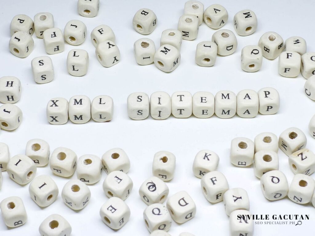 Dice spell "XML Sitemap" on white background.