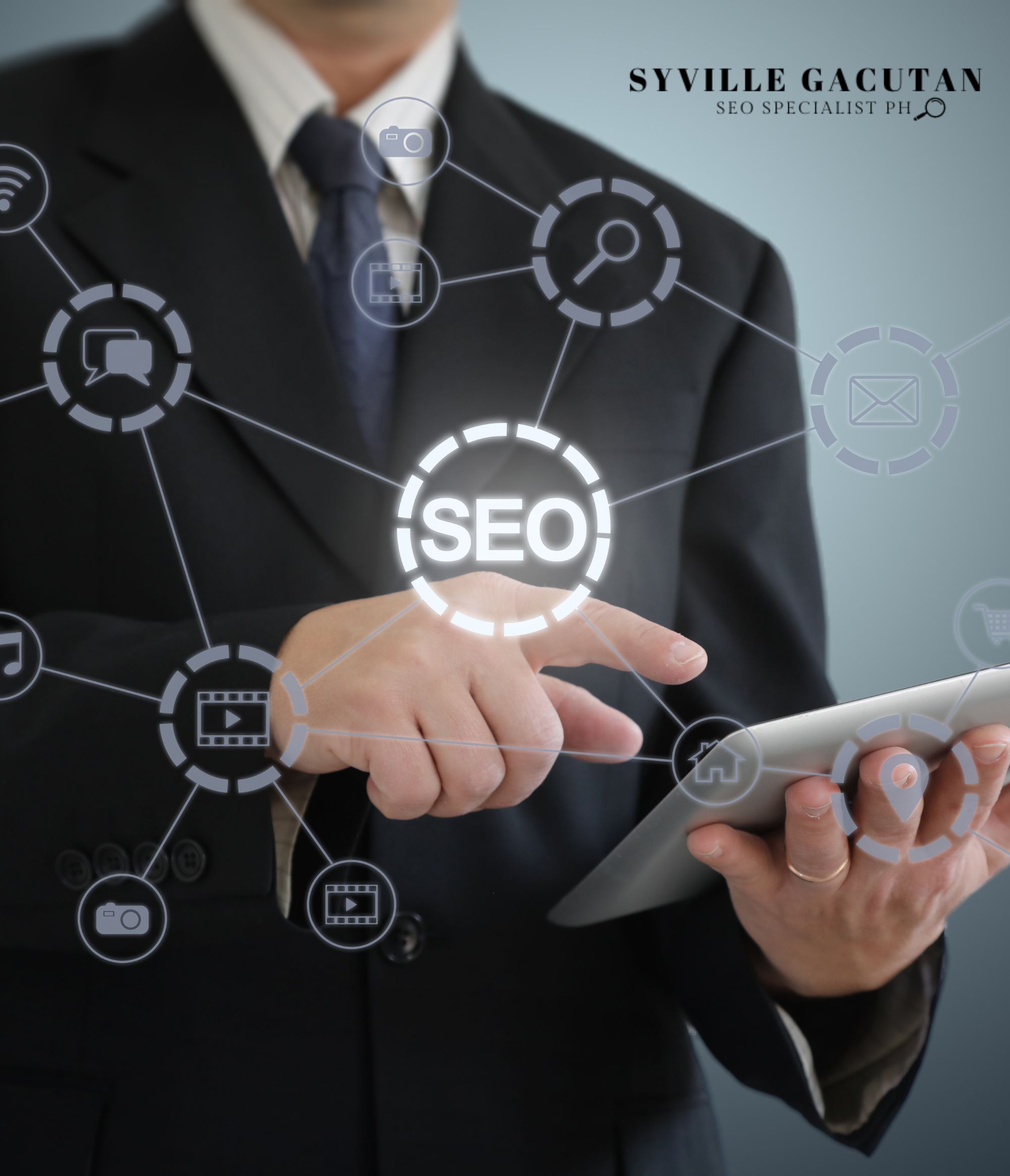 Man in suit interacting with SEO network icons on tablet.
