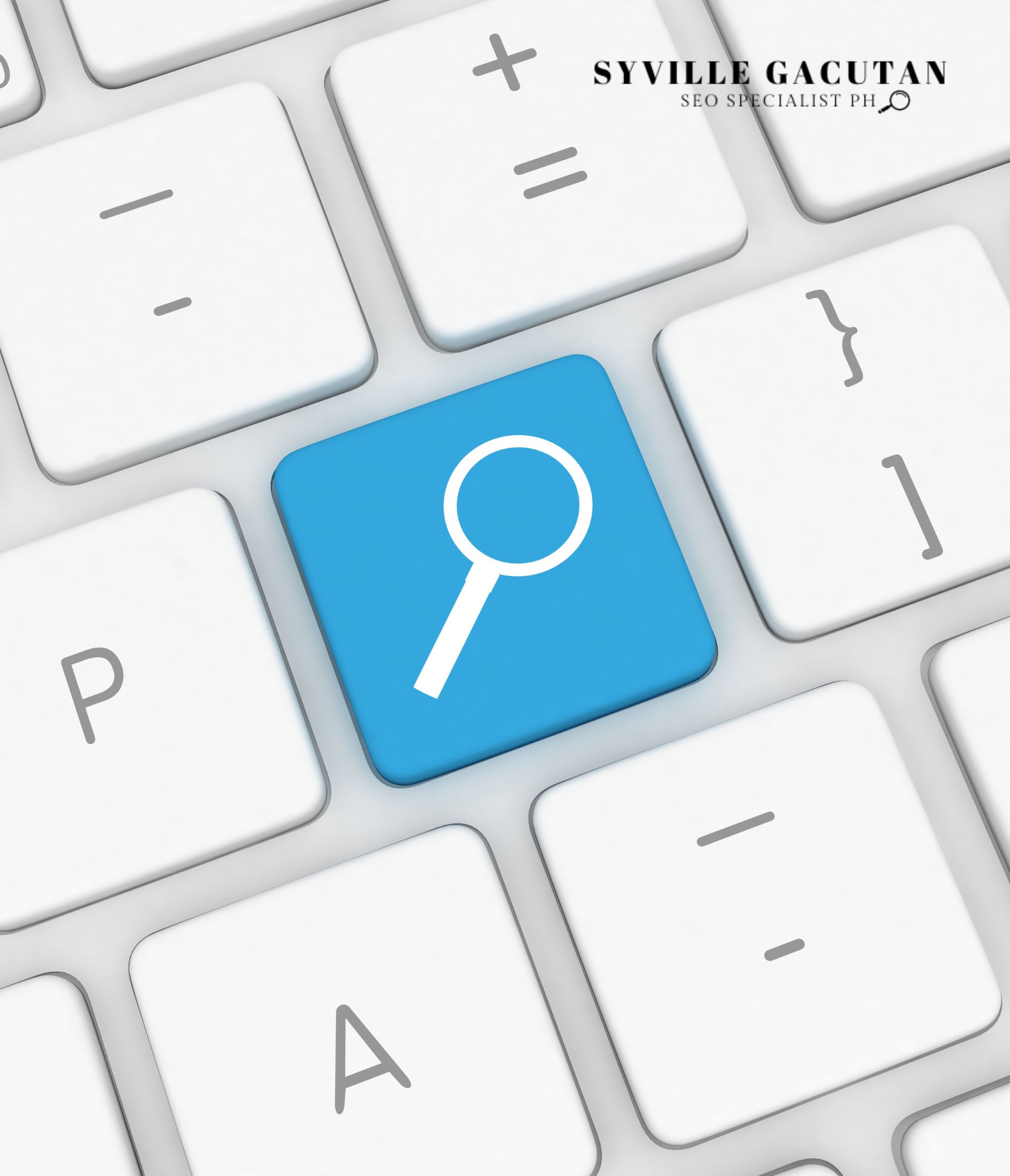 Blue search icon on a white keyboard key.