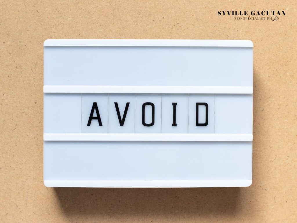 White lightbox displaying "AVOID" text on a beige background.