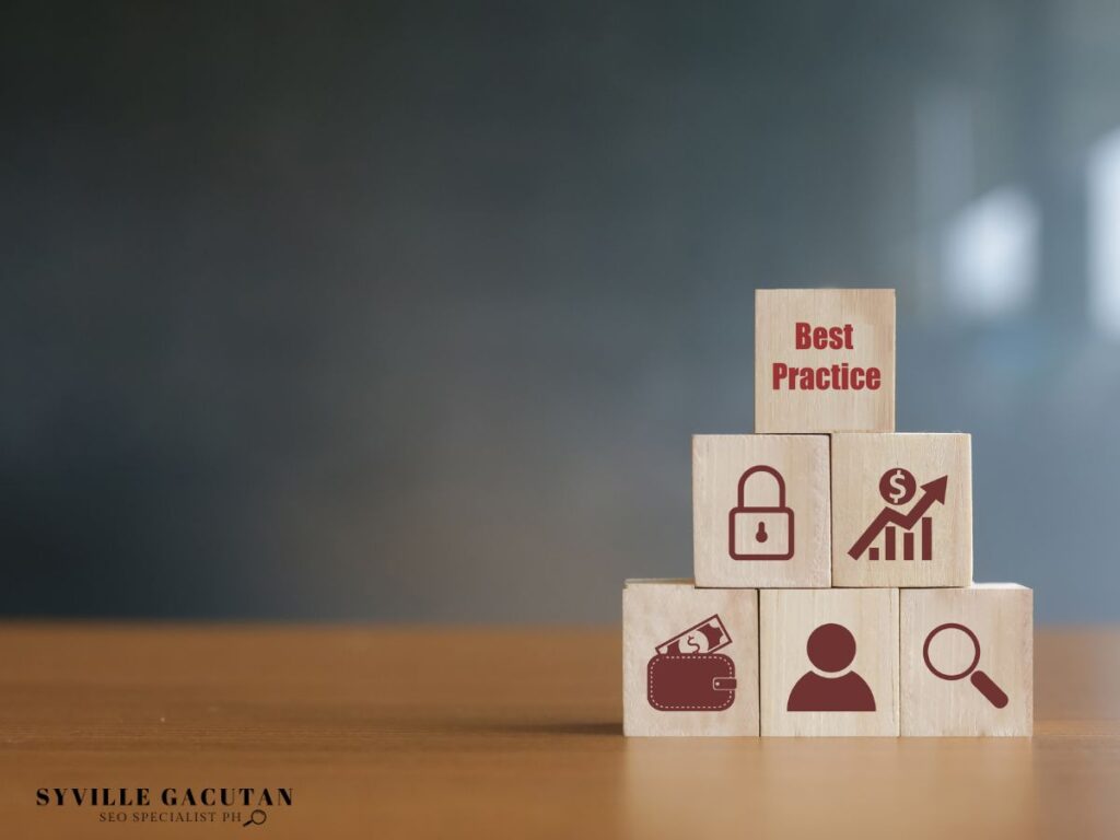 Wooden blocks showing business icons and "Best Practice" text arranged in pyramid formation.