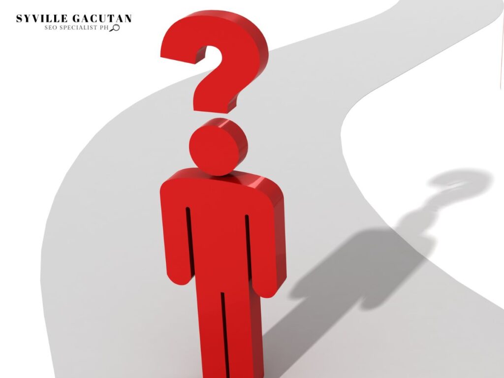 Red figure with a question mark above its head, standing on a curved gray path.