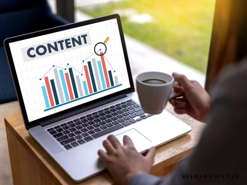 Laptop with "Content" and graph on the screen.