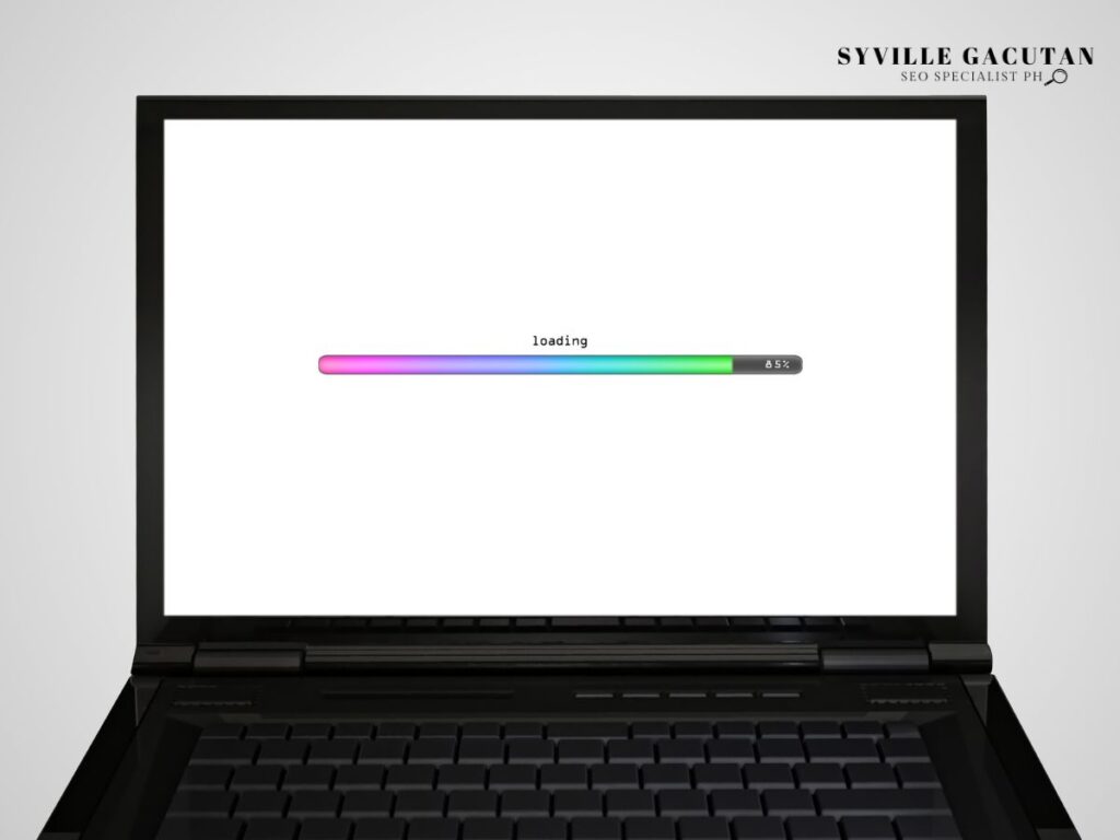 Laptop screen with a colorful loading progress bar at 85%.