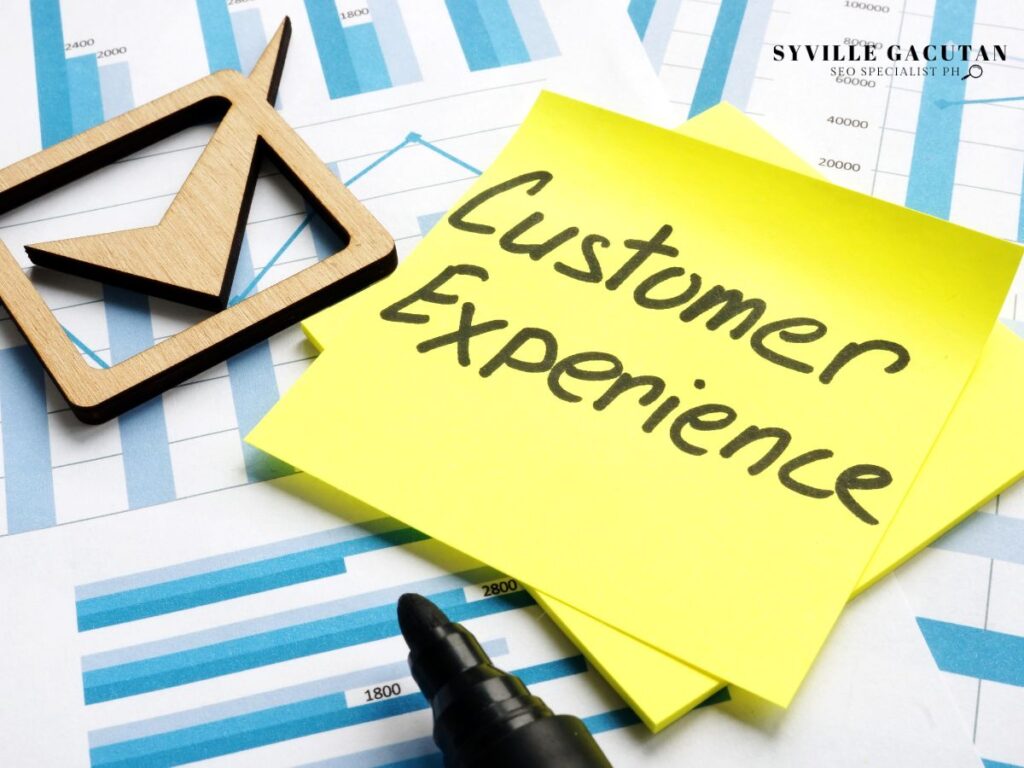 Sticky note reading "Customer Experience" on top of graphs.