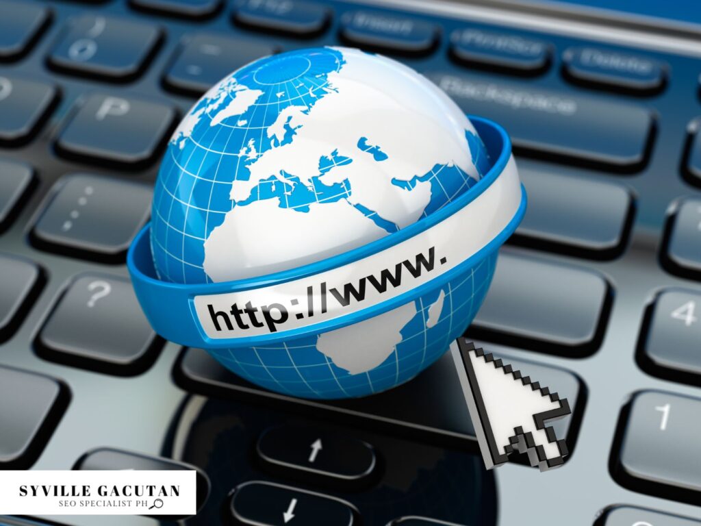 Blue globe with URL text band on laptop keyboard with cursor icon.