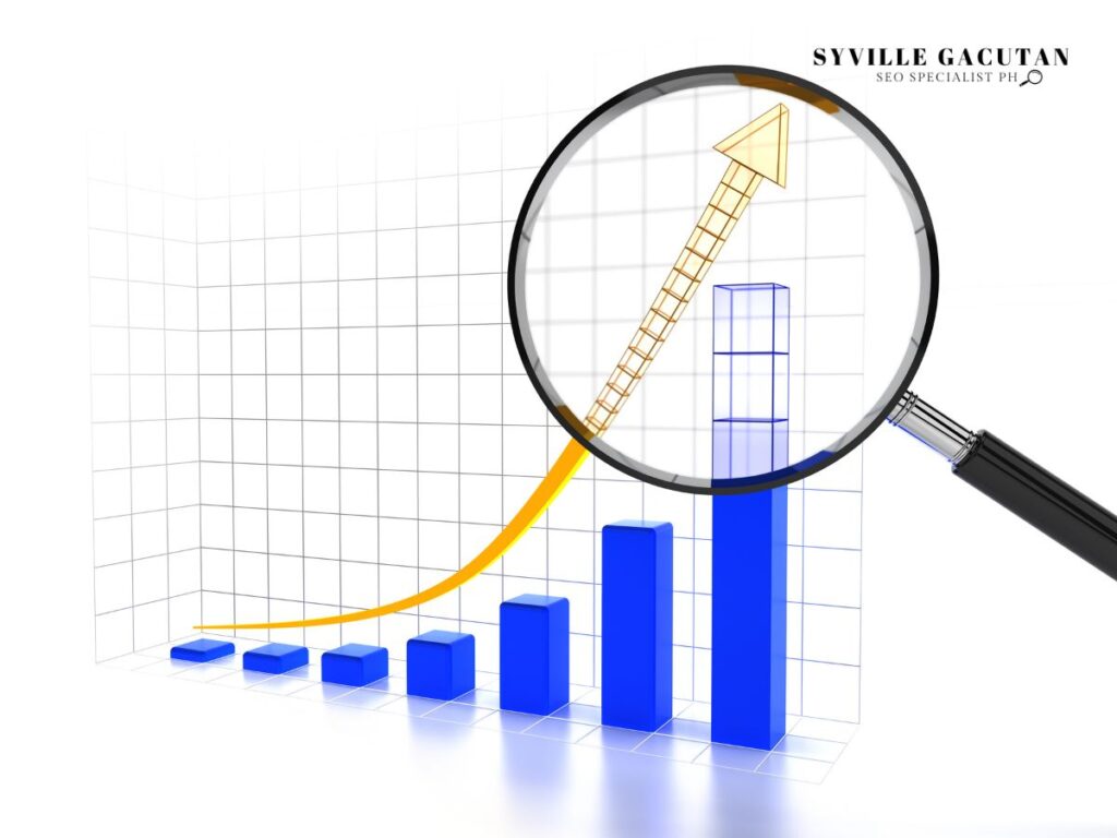 Magnifying glass showing upward trend on bar graph.