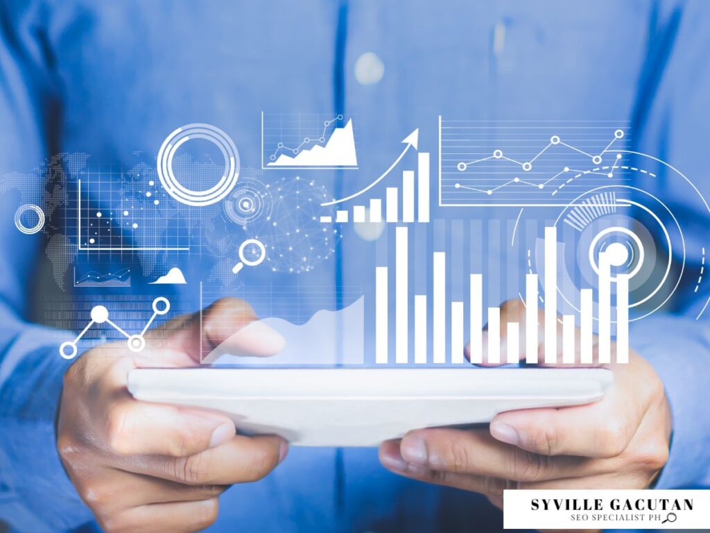 Hands holding a tablet with projected data graphs and charts.