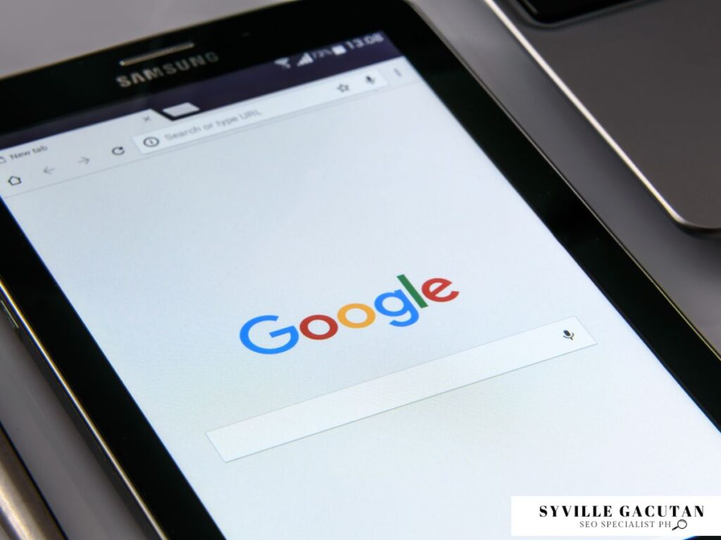 Tablet showing Google homepage in a search browser.