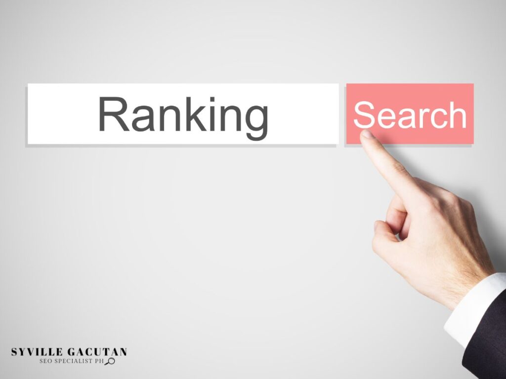 Hand pointing at "Search" button next to "Ranking" text on minimalist white interface design.