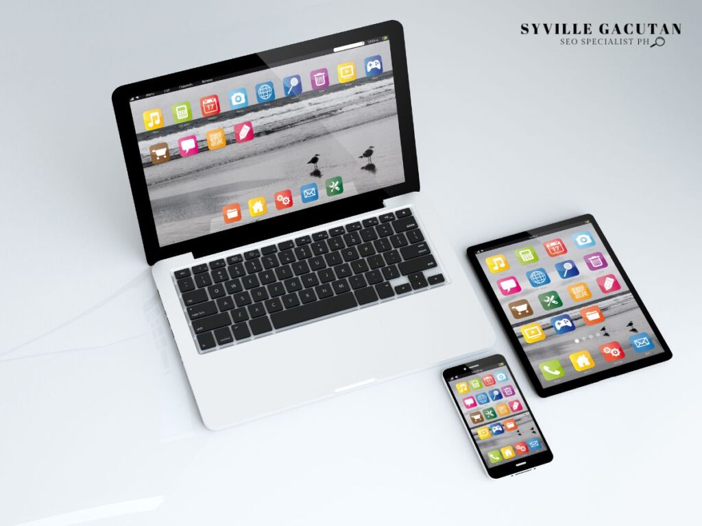 Laptop, tablet, and phone with identical app displays on screens.