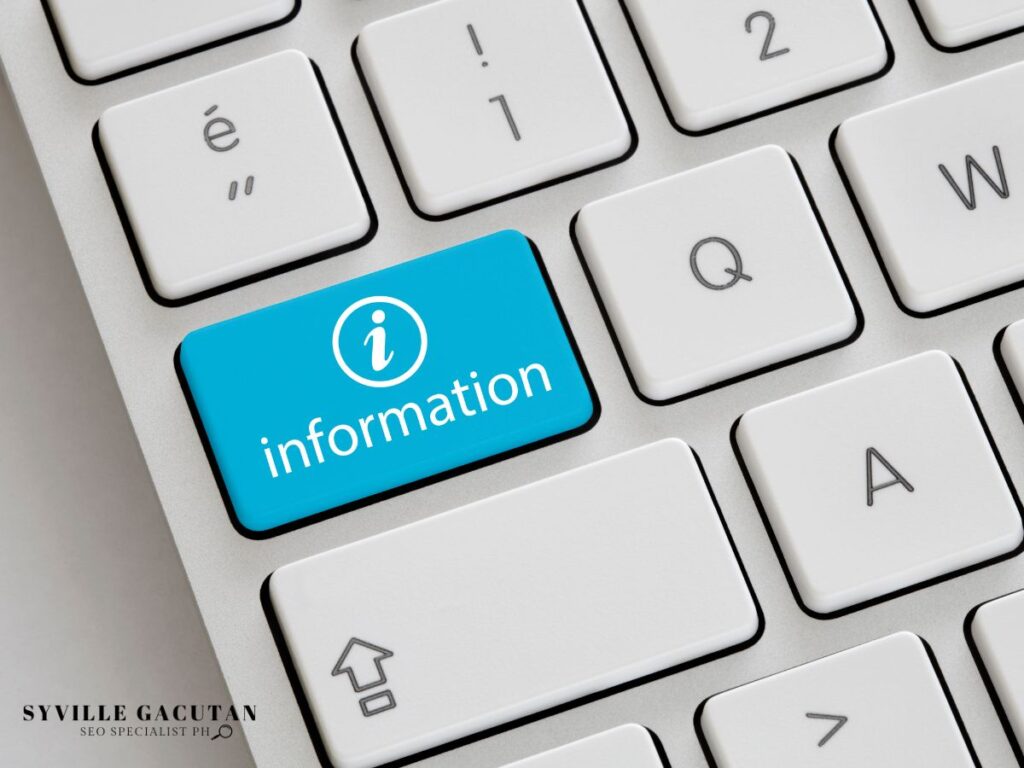 Keyboard with a blue key labeled "Information."