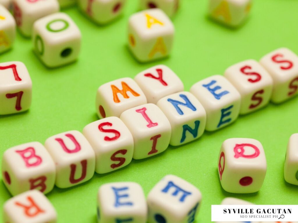 Letter blocks spelling "MY BUSINESS" on a green background.