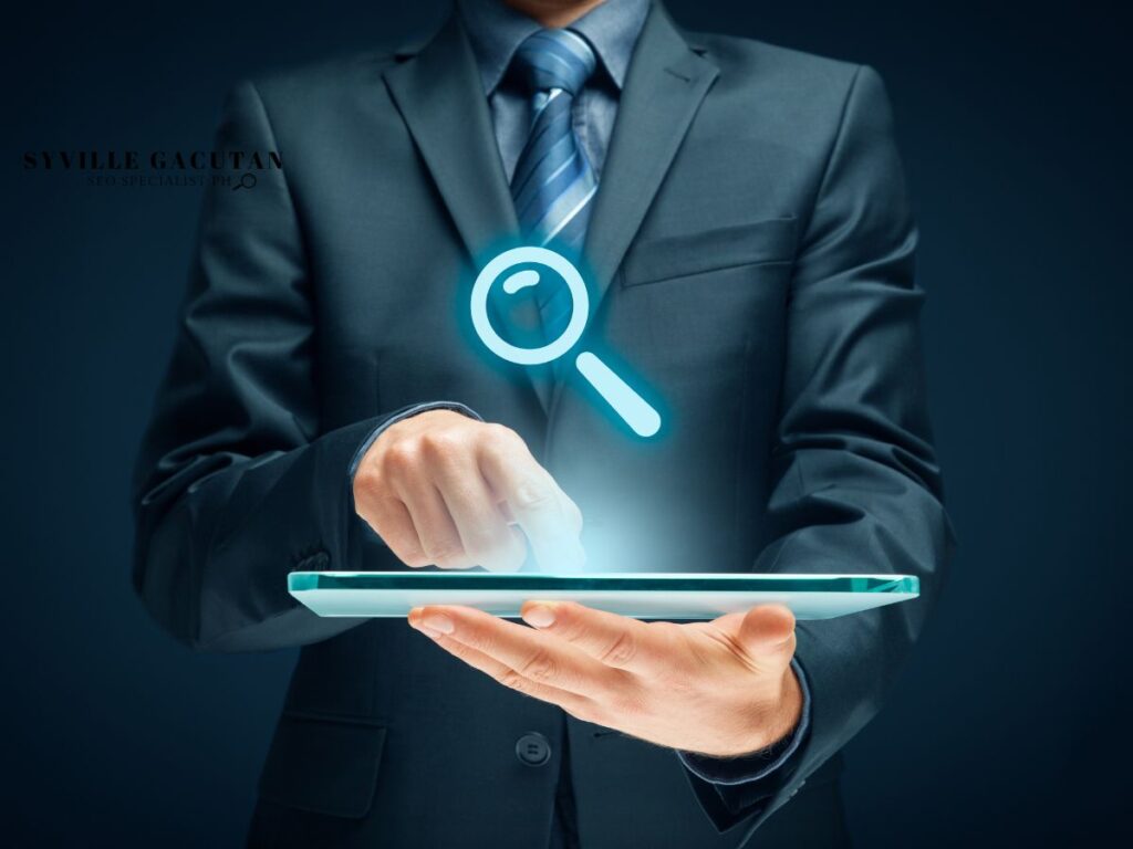 Person holding tablet with a search icon floating above.