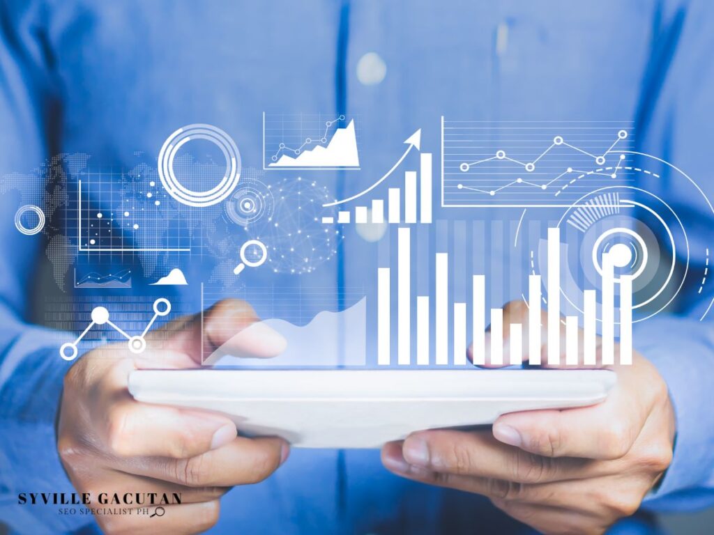 Data visualization with graphs on a tablet held by a person.