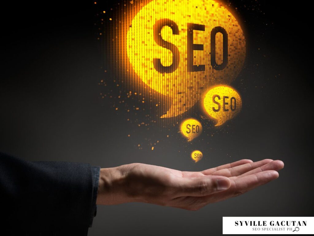 Hand under glowing "SEO" text in floating speech bubbles.