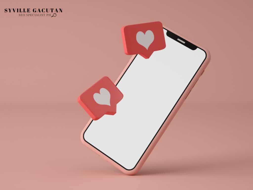 Floating smartphone with two heart icons.